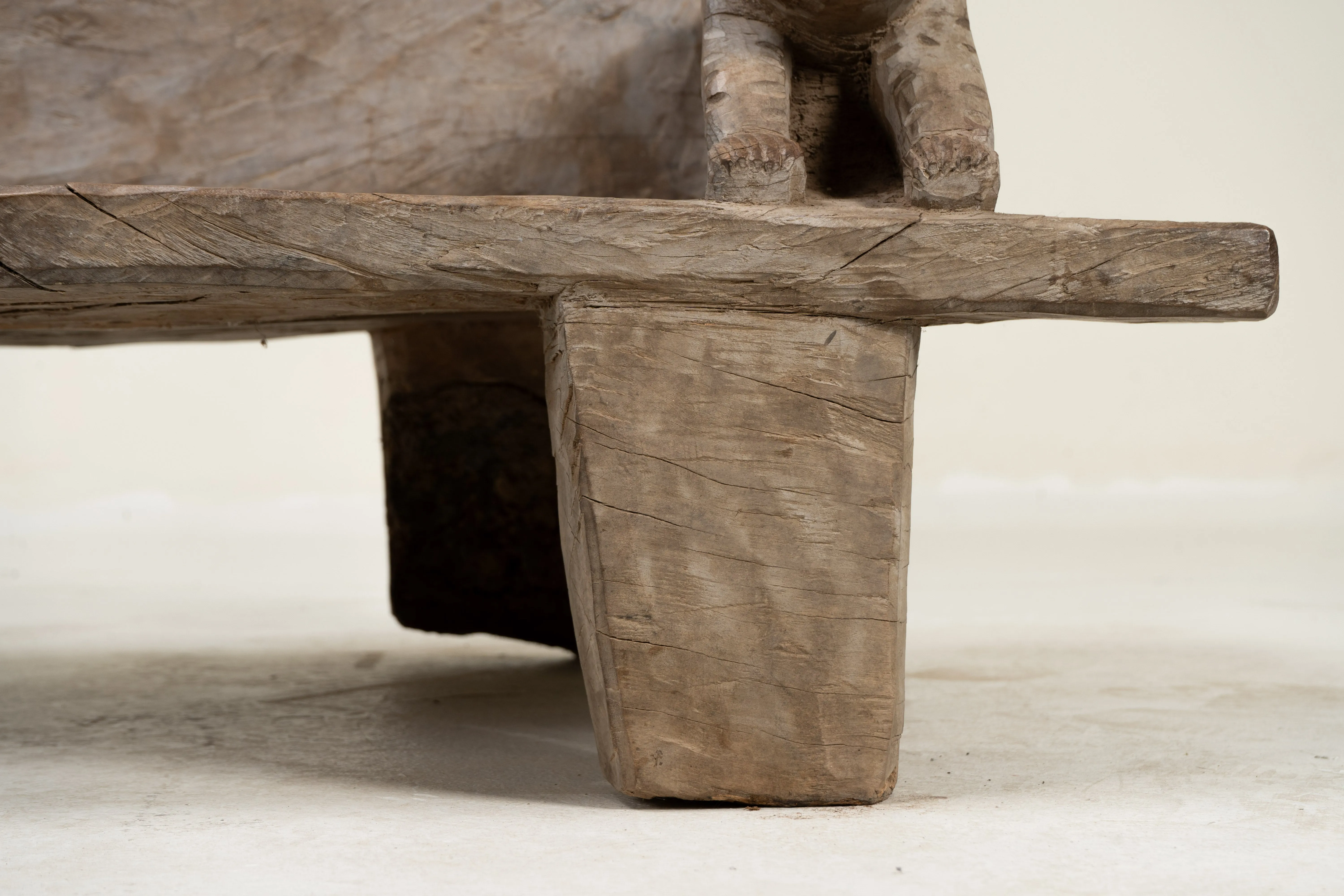 A Wooden Sofa Bench with Animal Sculptures