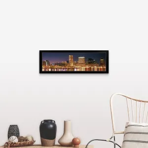 "Buildings lit up at dusk, Baltimore, Maryland" Black Framed Print