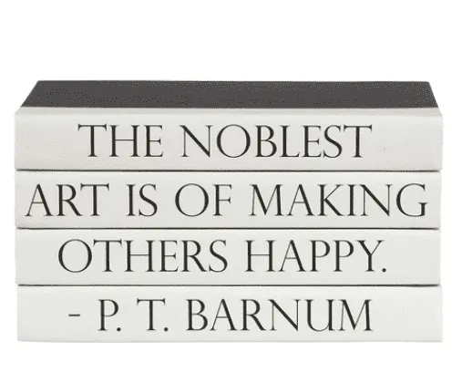 "THE NOBLEST ART IS OF MAKING OTHERS HAPPY" Quote Book Stack